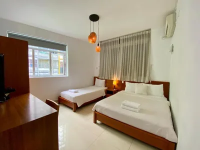 Deluxe-Dreibettzimmer — The Alley Saigon Hotel